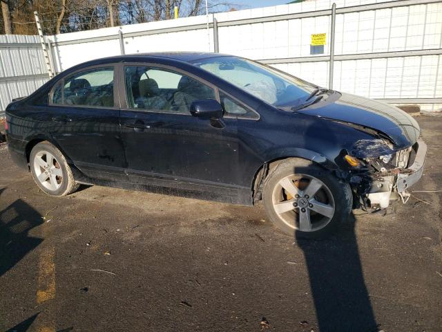 Photo 4 from auction – 2011 HONDA CIVIC LX-S with VIN 19XFA1F65BE036883