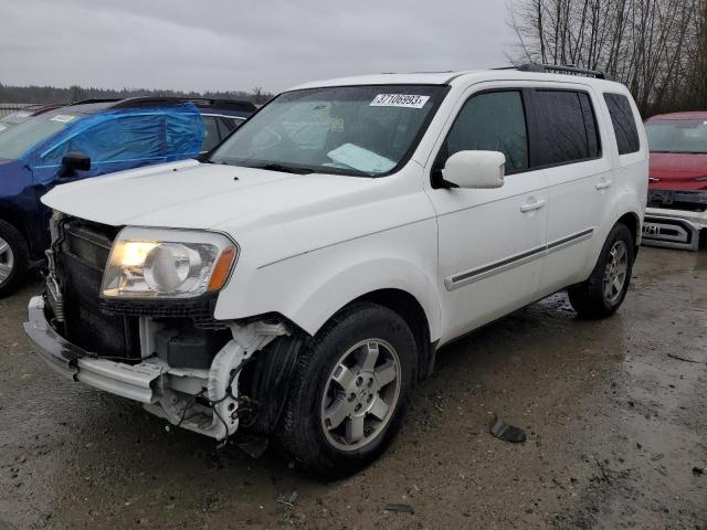 HONDA PILOT TOUR 2010 with VIN 5FNYF4H99AB018432 - Photo from auction
