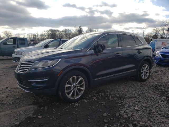 LINCOLN MKC 2015 with VIN 5LMTJ2AHXFUJ14916 - Photo from auction