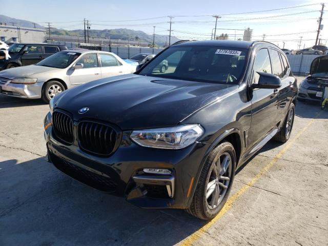 BMW X3 XDRIVEM 2019 with VIN 5UXTS3C51K0Z09849 - Photo from auction
