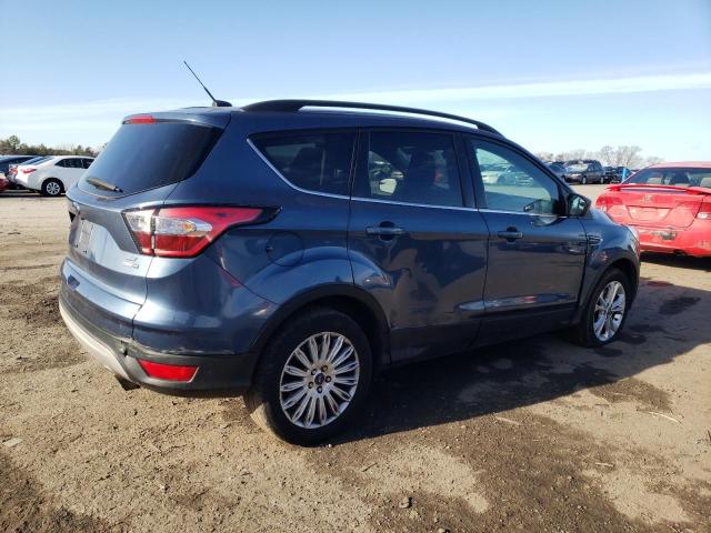 Photo 3 from auction – 2018 FORD ESCAPE SE with VIN 1FMCU9GD0JUC40671