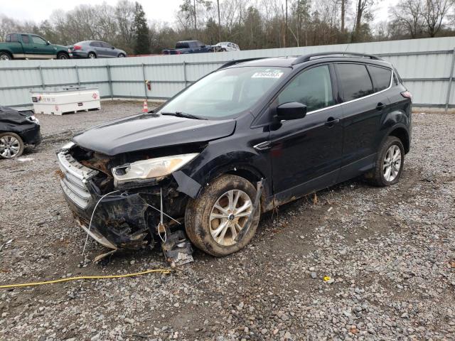 FORD ESCAPE SE 2018 with VIN 1FMCU0GD5JUA43202 - Photo from auction