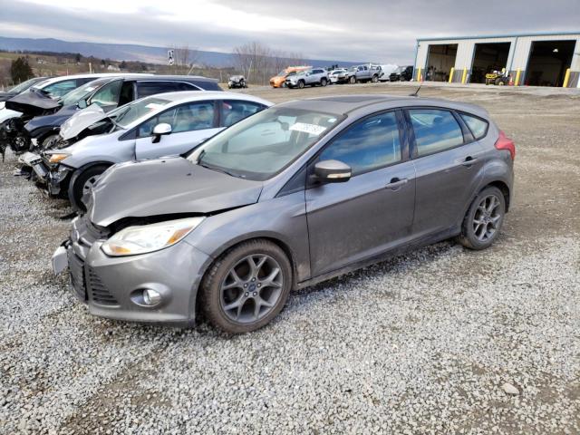 FORD FOCUS SE 2013 with VIN 1FADP3K22DL155057 - Photo from auction