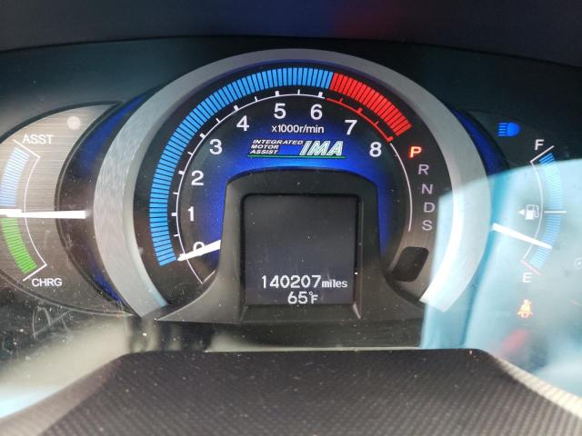 Photo 9 from auction – 2010 HONDA INSIGHT EX with VIN JHMZE2H7XAS039463