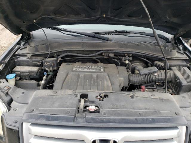Photo 12 from auction – 2006 HONDA PILOT EX with VIN 2HKYF18576H512552