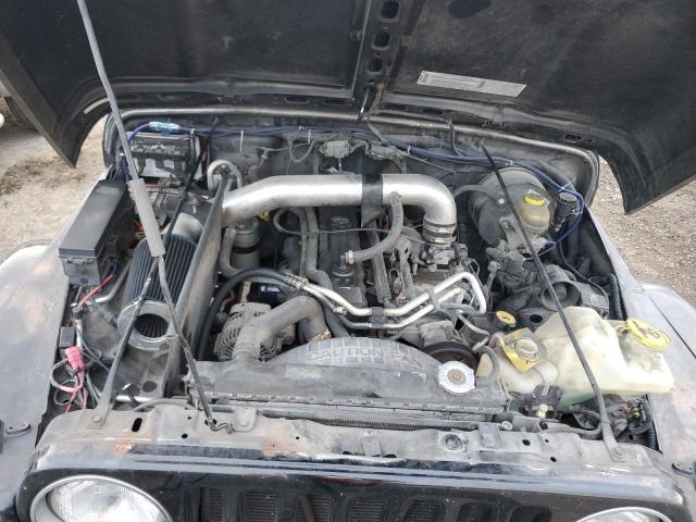 Photo 11 from auction – 2003 JEEP WRANGLER C with VIN 1J4FA39SX3P363862
