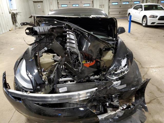 Photo 11 from auction – 2022 TESLA MODEL 3 with VIN 5YJ3E1EB6NF290980