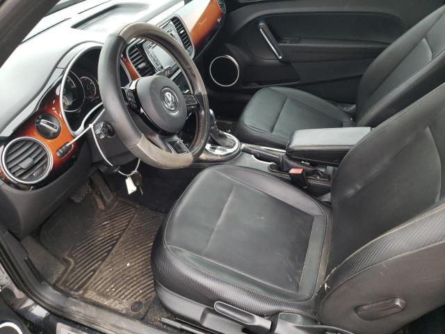 Photo 7 from auction – 2013 VOLKSWAGEN BEETLE with VIN 3VWJX7AT0DM653431