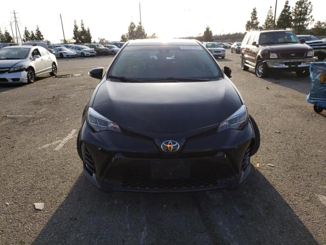 Photo 5 from auction – 2018 TOYOTA COROLLA L with VIN 5YFBURHEXJP739952