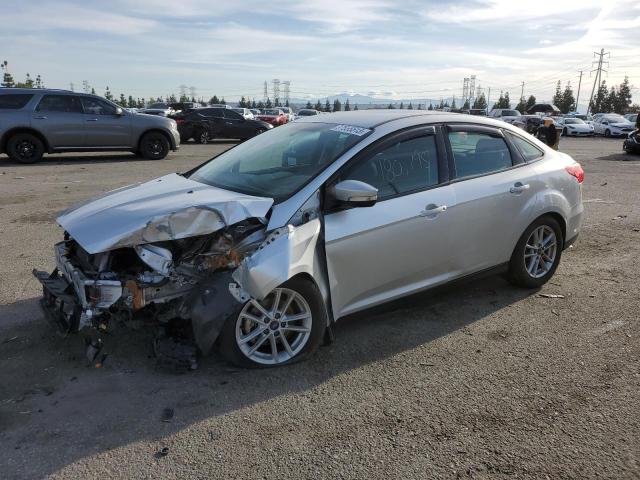 FORD FOCUS SE 2017 with VIN 1FADP3F28HL337183 - Photo from auction