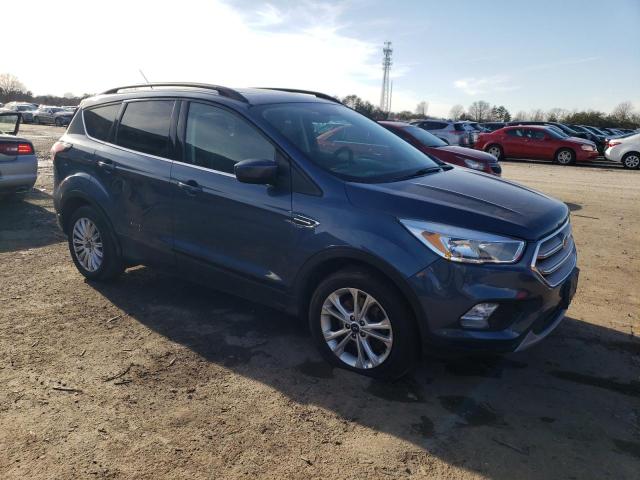 Photo 4 from auction – 2018 FORD ESCAPE SE with VIN 1FMCU9GD0JUC40671