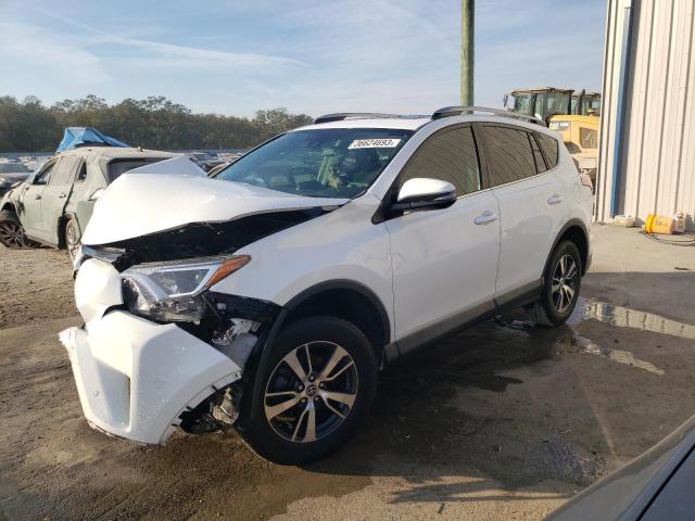 TOYOTA RAV4 XLE 2017 with VIN 2T3WFREV9HW402964 - Photo from auction