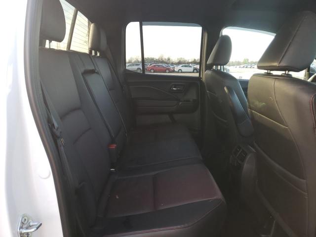 Photo 10 from auction – 2022 HONDA RIDGELINE with VIN 5FPYK3F84NB030095