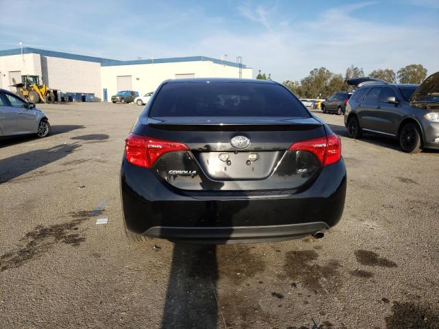 Photo 6 from auction – 2018 TOYOTA COROLLA L with VIN 5YFBURHEXJP739952