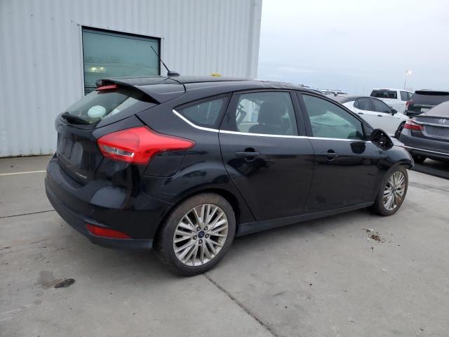 Photo 3 from auction – 2015 FORD FOCUS TITA with VIN 1FADP3N22FL334729