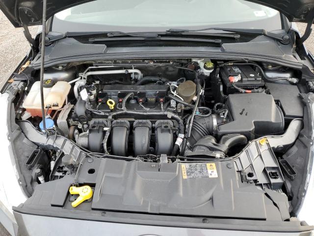 Photo 11 from auction – 2015 FORD FOCUS SE with VIN 1FADP3F29FL218829