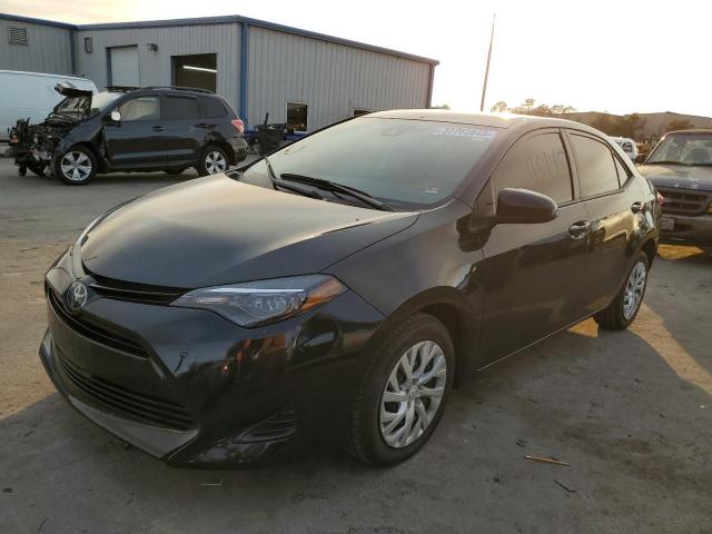 TOYOTA COROLLA L 2019 with VIN 5YFBURHE5KP943916 - Photo from auction
