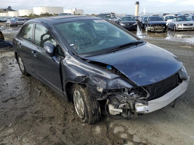 Photo 4 from auction – 2006 HONDA CIVIC HYBR with VIN JHMFA36296S026903