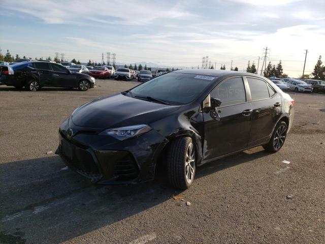 TOYOTA COROLLA L 2018 with VIN 5YFBURHEXJP739952 - Photo from auction