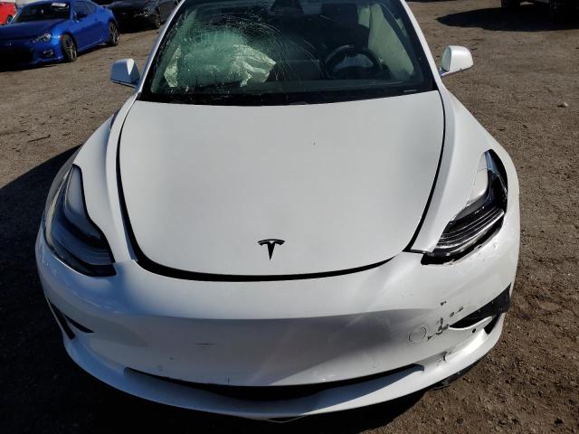 Photo 11 from auction – 2019 TESLA MODEL 3 with VIN 5YJ3E1EA2KF464658
