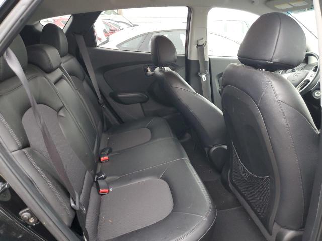 Photo 11 from auction – 2012 HYUNDAI TUCSON GLS with VIN KM8JUCAC8CU528851