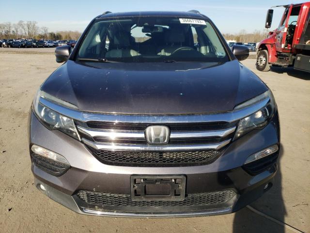 Photo 5 from auction – 2017 HONDA PILOT TOUR with VIN 5FNYF5H93HB041611