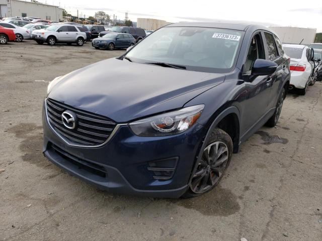 MAZDA CX-5 GT 2016 with VIN JM3KE4DY5G0668072 - Photo from auction
