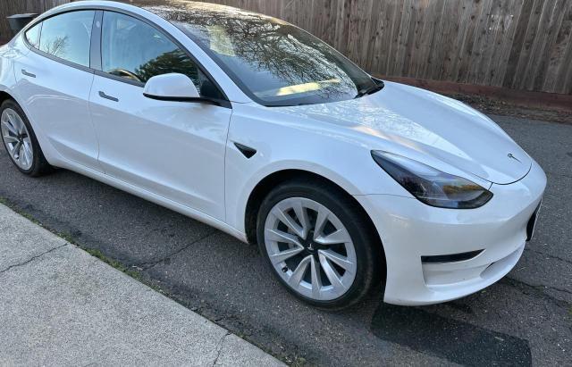 TESLA MODEL 3 2022 with VIN 5YJ3E1EA2NF144132 - Photo from auction
