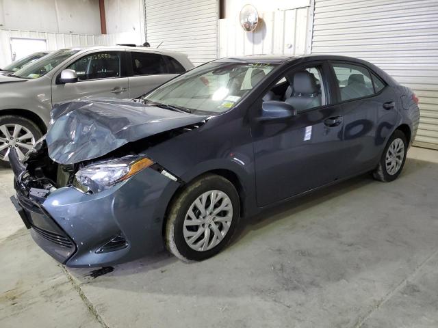 TOYOTA COROLLA L 2017 with VIN 2T1BURHE9HC861857 - Photo from auction