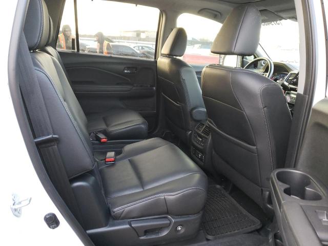 Photo 11 from auction – 2021 HONDA PILOT TOUR with VIN 5FNYF5H69MB021024