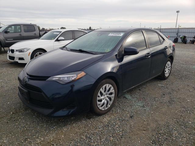 TOYOTA COROLLA L 2019 with VIN 5YFBURHE6KP912299 - Photo from auction