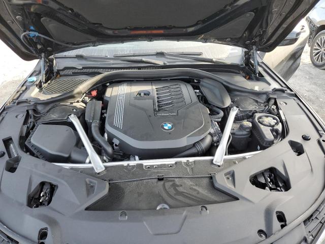 Photo 11 from auction – 2022 BMW 840I with VIN WBAAE2C01NCH15257