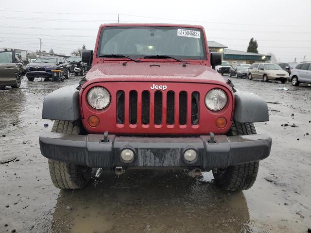 Photo 5 from auction – 2011 JEEP WRANGLER U with VIN 1J4BA6H19BL526483