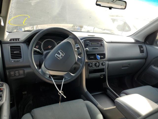 Photo 8 from auction – 2006 HONDA PILOT LX with VIN 2HKYF18106H532512