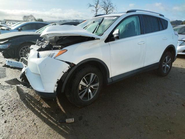 TOYOTA RAV4 XLE 2017 with VIN 2T3WFREV9HW348498 - Photo from auction