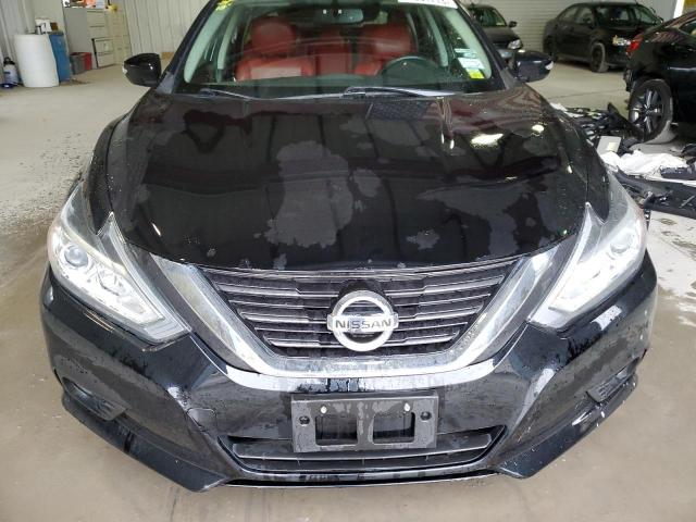 Photo 5 from auction – 2018 NISSAN 210 with VIN 1N4AL3AP5JC209846