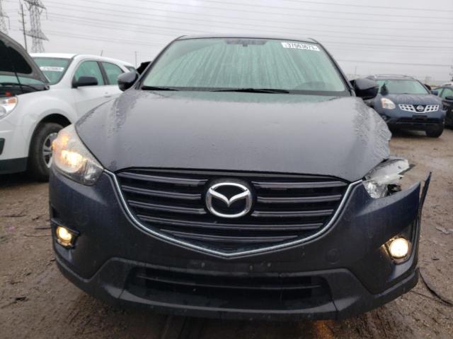 Photo 5 from auction – 2016 MAZDA CX-5 TOURI with VIN JM3KE4CY4G0693448