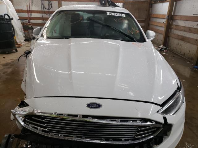 Photo 5 from auction – 2018 FORD FUSION TIT with VIN 3FA6P0D97JR139001