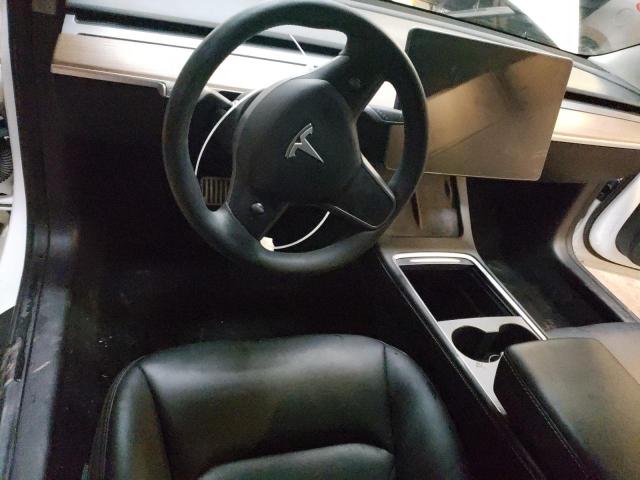 Photo 8 from auction – 2021 TESLA MODEL 3 with VIN 5YJ3E1EA5MF083034