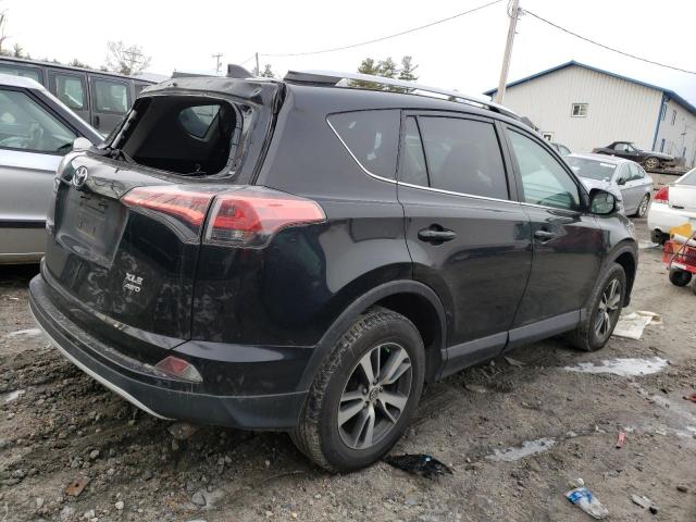Photo 3 from auction – 2016 TOYOTA RAV4 XLE with VIN 2T3RFREV6GW466357