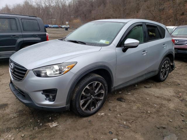 MAZDA CX-5 GT 2016 with VIN JM3KE4DY8G0803304 - Photo from auction