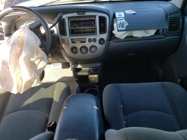 Photo 8 from auction – 2004 MAZDA TRIBUTE LX with VIN 4F2CZ04104KM34306