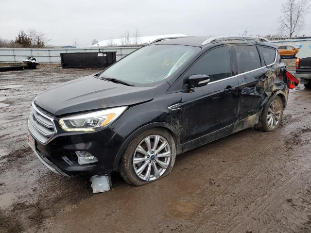 FORD ESCAPE TIT 2017 with VIN 1FMCU9JD5HUC64418 - Photo from auction