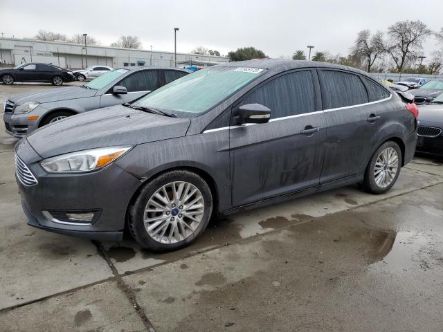 FORD FOCUS TITA 2015 with VIN 1FADP3J23FL369379 - Photo from auction