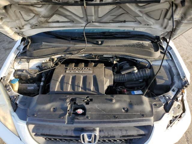 Photo 12 from auction – 2005 HONDA PILOT EXL with VIN 5FNYF18505B063230