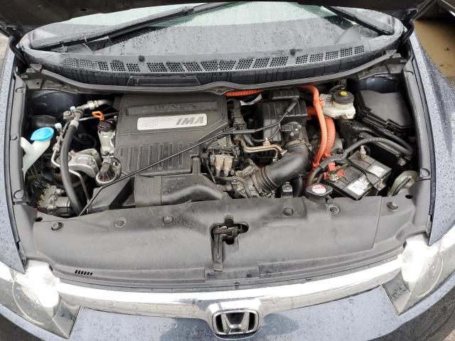 Photo 11 from auction – 2006 HONDA CIVIC HYBR with VIN JHMFA36276S007234