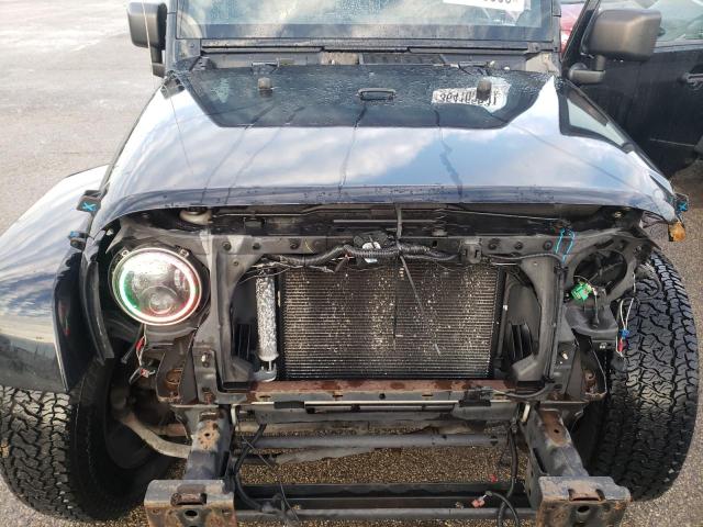 Photo 12 from auction – 2011 JEEP WRANGLER U with VIN 1J4BA5H15BL594502