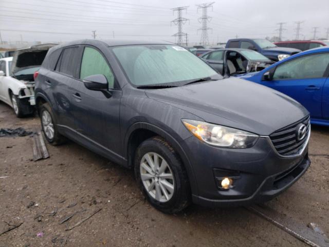 Photo 4 from auction – 2016 MAZDA CX-5 TOURI with VIN JM3KE4CY4G0693448