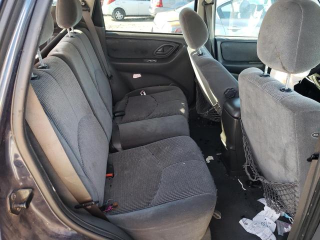 Photo 11 from auction – 2004 MAZDA TRIBUTE LX with VIN 4F2CZ04104KM34306