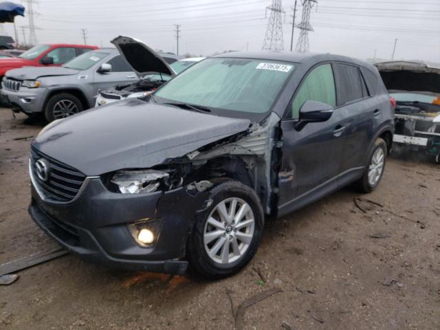 MAZDA CX-5 TOURI 2016 with VIN JM3KE4CY4G0693448 - Photo from auction
